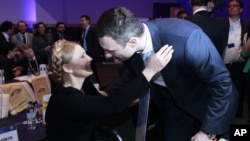 Yulia Tymoshenko, left, leader of Batkivshchyna, (Ukraine) greets Vitali Klitschko leader of UDAR (Ukraine) at the European People's Election Congress in Dublin, Ireland, March 6, 2014.
