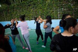 Female students take self-defense classes in Nezahualcoyotl, Mexico state, Aug. 25, 2017.
