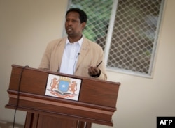 FILE - Abdirahman Omar Osman, spokesperson of the President of Somalia, addresses the Somali media, Oct. 25, 2013. (AFP Photo / AU-UN IST Photo / Stuart Price)