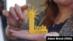 Linda Bardha shows off a project for a 3D printing class