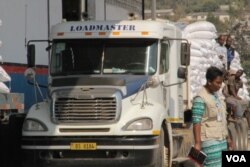 For the past three years, over half of Malawi's population has been relying on food aid such as the maize loaded on this truck at the WFP warehouse in Blantyre. (Photo: Lameck Masina for VOA)