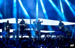 Georgia's Nika Kocharov and Young Georgian Lolitaz perform the song 'Midnight Gold' during the Eurovision song contest final in Stockholm, Sweden, May 14, 2016.