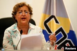 FILE - Venezuela's National Electoral Council (CNE) President Tibisay Lucena speaks during a news conference in Caracas, Venezuela, Aug. 1, 2016.