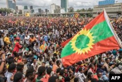 FILE - People gather to celebrate the return of the formerly banned anti-government group the Oromo Liberation Front (OLF) at Mesquel Square in Addis Ababa, Ethiopia, Sept. 15, 2018.