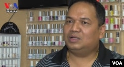 Kong Chansokun, owner of Star Nail salon.