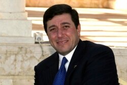 Dr. Bassem Awadallah (saat itu direktur Kantor Raja Abdullah II) dari Yordania, menghadiri perayaan untuk memperingati Hari Kemerdekaan, di Amman, Yordania, 25 Mei 2008.