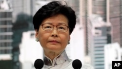 Hong Kong's Chief Executive Carrie Lam speaks at a press conference, Saturday, June 15, 2019, in Hong Kong. (AP Photo/Kin Cheung)