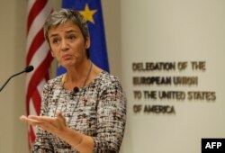 FILE - European Union Commissioner for Competition Margrethe Vestager speaks during a news conference at the EU Delegation in Washington, Sept. 19, 2016.