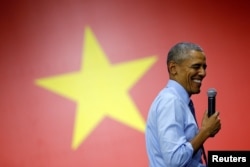 U.S. President Barack Obama reacts as he attends a town hall meeting with members of the Young Southeast Asian Leaders Initiative (YSEALI) at the GEM Center in Ho Chi Minh City, Vietnam, May 25, 2016.