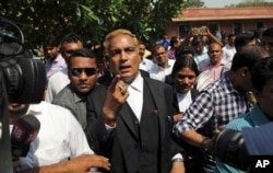 Defense attorney A. P. Singh, representing three of the four men convicted for the 2012 fatal gang rape on a moving bus, arrives to brief the media after the Supreme court verdict, in New Delhi, India, May 5, 2017.