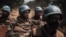 FILE - Moroccan peacekeepers from the U.N. Multidimensional Integrated Stabilization Mission in the Central African Republic (MINUSCA) patrol in Bangassou, Feb. 3, 2021. The force's mandate has been extended until November 2025.