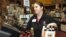 A cashier at Holiday Market, in Royal Oak, Michigan, rings up alcohol purchases, May 3, 2005. 