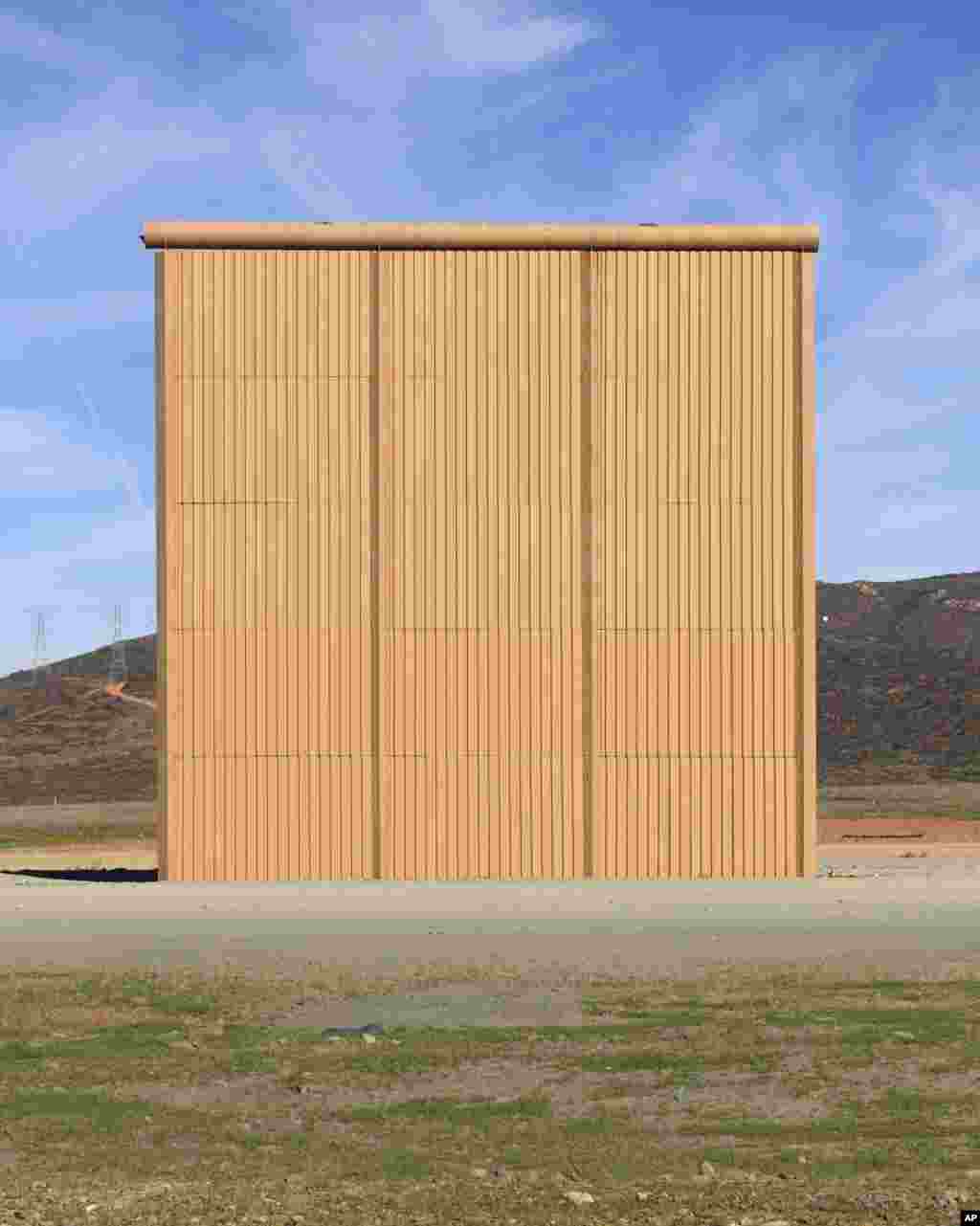 A border wall prototype stands in San Diego near the Mexico-U.S. border, seen from Tijuana, Mexico, Dec. 22, 2018.