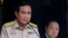 Thailand's Prime Minister Prayuth Chan-ocha speaks during a news conference after his meeting with National Security Council as Deputy Prime Minister and Defense Minister Prawit Wongsuwan looks on at Government House in Bangkok, Aug. 15, 2016. 