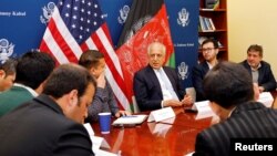 U.S. special envoy for peace in Afghanistan, Zalmay Khalilzad, center, speaks during a roundtable discussion with Afghan media at the U.S Embassy in Kabul, Afghanistan Jan. 28, 2019. 