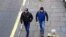A handout picture taken in Salisbury on March 4, 2018, and released by the British Metropolitan Police Service in London on September 5, 2018, shows Alexander Petrov (R) and Ruslan Boshirov, who are wanted by British police.