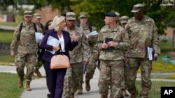 FILE - Army Secretary Christine Wormuth walks during a tour with soldiers at Fort Jackson, a U.S. Army Training Center, Sept. 25, 2024, in Columbia, S.C. 