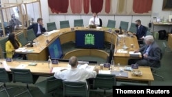 Dominic Cummings, former special advisor for Britain's PM Boris Johnson faces questions from UK lawmakers in London, May 26, 2021.