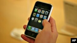 FILE - The Apple iPhone turned 10 years old on Thursday. Here is an image of the first phone, released on June 29, 2007. (AP Photo/Andrei Pungovschi, file)