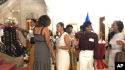 Haitian-American women mingle and discuss the earthquake at the Haitian Ladies Brunch at the Embassy of Haiti in Washington, Oct. 7, 2018. (Photo: S. Lemaire / VOA ) 