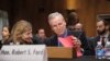 FILE - Robert Ford, then the U.S. ambassador to Syria, arrives to testify to the Senate Foreign Relations Committee about the conflict in Syria, on Capitol Hill in Washington, Oct. 31, 2013.