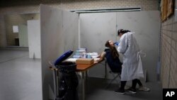 Residents of Bergschenhoek, Netherlands, take part in a mass test of all of the municipality's 62,000 residents that started Jan. 13, 2021.