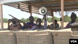 Members of self-defense groups on are seen on duty in Mora, Cameroon. (M.E. Kindzeka/VOA)
