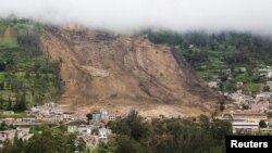 A view shows the site of a landslide triggered by heavy rains in Alausi, Ecuador March 28, 2023.