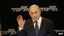 FILE - Israeli Prime Minister Benjamin Netanyahu speaks at a press conference regarding his intention to file a request to the Knesset for immunity from prosecution, in Jerusalem, Jan. 1, 2020. 
