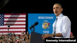 President Barack Obama speaks at the University of Wisconsin at La Crosse, in La Crosse, Wis., July 2, 2015, about the economy and to promote a proposed Labor Department rule that would make more workers eligible for overtime.