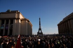 Demonstrators gather during a protest against a bill on police images, in Paris, Nov. 21, 2020.