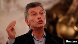 FILE - Argentina's President Mauricio Macri addresses the media during a news conference in Buenos Aires, Feb. 16, 2017. 