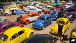FILE - Volkswagen Beetles are displayed during the annual gathering of the "Beetle club" in Yakum, central Israel, April 21, 2017. 