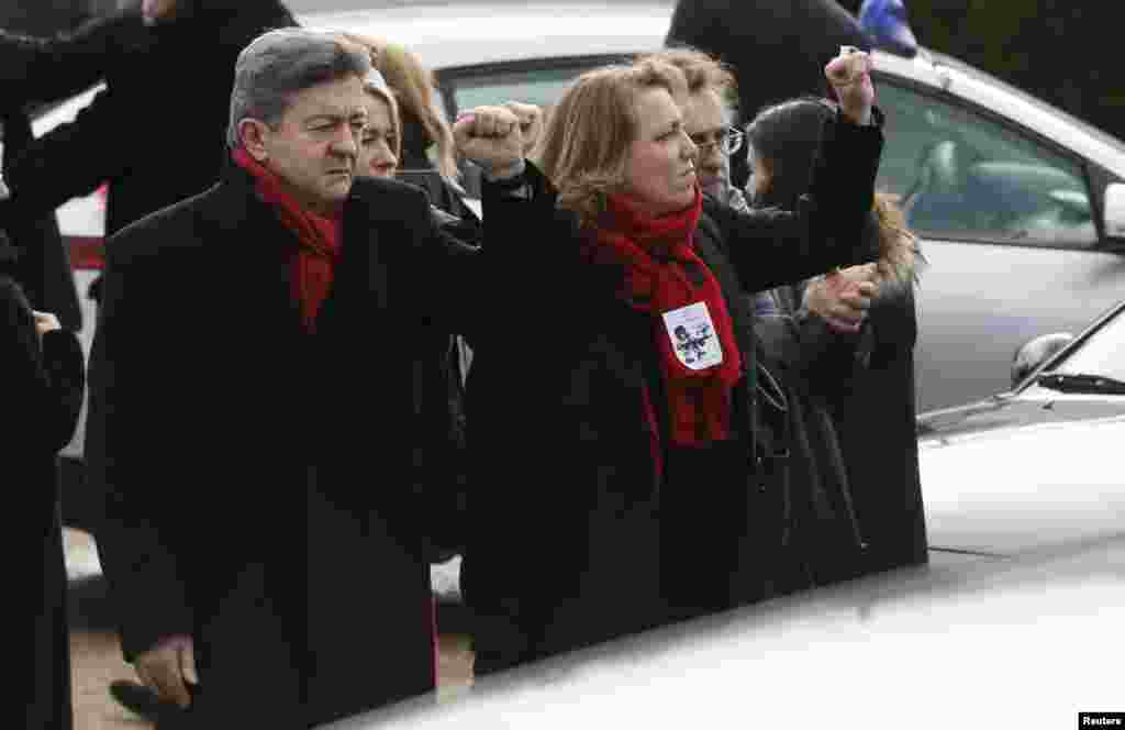 Jean-Luc Melenchon (left) the leader of the French far-left Parti de Gauche, at a tribute to late satirical French magazine Charlie Hebdo cartoonist and editor-in-chief Stephane Charbonnier, in Pontoise, near Paris, Jan. 16, 2015.