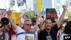 FILE - Families and supporters of Israeli hostages held by Hamas in Gaza since October 7 set out on a protest march from Tel Aviv toward Jerusalem in an attempt to pressure their government to negotiate a deal to release their loved ones, July 10, 2024.
