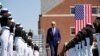 President Joe Biden congratulates Cadet Daisy Anne Atayan, one of the first two female Philippine Coast Guard-sponsored cadets, left, during the commencement at the U.S. Coast Guard Academy in New London, Conn., May 19, 2021. 