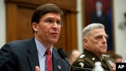Sekretaris Pertahanan Mark Esper, kiri, dan Ketua Kepala Gabungan Jenderal Mark Milley, bersaksi di depan komite DPR yang membahas kebijakan AS di Suriah, Rabu, 11 Desember 2019, di Capitol Hill di Washington. (Foto: AP/Jacquelyn Martin)
