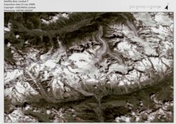 This satellite photo provided by UNITAR-UNOSAT, and taken by USGS/NASA in July 25, 1999, shows the Mont Blanc massif in the Italian Alps near Courmayeur.