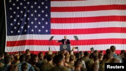 U.S. President Donald Trump delivers remarks to U.S. military personnel at Naval Air Station Sigonella following the G7 Summit, in Sigonella, Sicily, Italy, May 27, 2017.