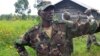 General Sultani Makenga, military leader of the M23 rebels, looks on while surrounded by his bodyguards at Mutaho, in eastern Democratic Republic of Congo, May 27, 2013.