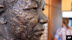 A statue of Former South African president Nelson Mandela at the entrance to the Robben Island ferry departure point at the V&A Waterfront in Cape Town, South Africa. (File)