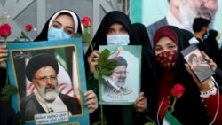 ក្រុម​អ្នក​គាំទ្រ​ប្រធានាធិបតី​ជាប់​ឆ្នោត​អ៊ីរ៉ង់ លោក Ebrahim Raisi អបអរ​សាទរ​ ក្រោយ​ពី​លោក​ឈ្នះ​ការ​បោះឆ្នោត​ប្រធានាធិបតី​ក្នុង​ទីក្រុង​តេហេរ៉ង់ ប្រទេស​អ៊ីរ៉ង់ ថ្ងៃទី១៩ ខែមិថុនា ឆ្នាំ២០២១។