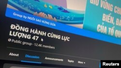 A Facebook page of a group called 'Keeping company with Force 47', which was identified by Vietnamese state media as being controlled by 'Force 47' cyber troops, is displayed on screen in this photo taken July 6, 2021 by REUTERS