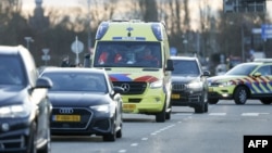 An ambulance leaves the Rotterdam The Hague Airport after the plane carrying former Philippine President Rodrigo Duterte landed, following his arrest on an International Criminal Court warrant tied to his deadly crackdown on drugs, on March 12, 2025. 