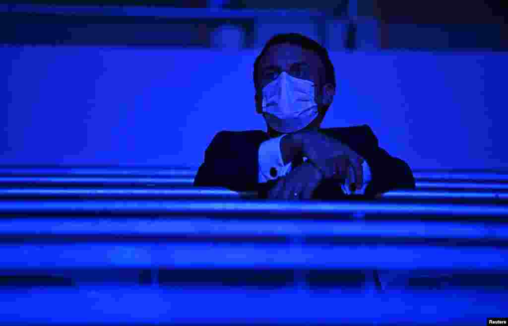 French President Emmanuel Macron wearing a protective face mask during the Olympics Opening Ceremony in Tokyo, Japan - July 23, 2021.