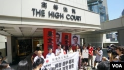 Hong Kong Democratic Party protest against the new electoral rule targeting advocates of independence.
