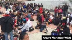 Nurses participate in a Zumba aerobic fitness program as a way of helping them to cope with working situations during the coronavirus outbreak within the Infectious Disease Unit grounds of the Kenyatta National Hospital in Nairobi, Kenya.