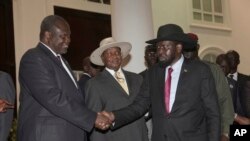 Tsohon mataimakin shugaban kasa Rick Machar da Shugaban kasar ta Sudan ta Kudu Silva Kiir sun sha hannu yayinda suka rabtaba hannu akan yarjejeniyar da suka cimma makon jiya