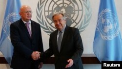 The new Russian Ambassador to the United Nations Vassily Nebenzia shakes hands after he presented his credentials to Secretary-General Antonio Guterres at U.N. Headquarters in New York City, New York, July 28, 2017.