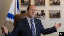 FILE - Jerusalem Mayor Nir Barkat speaks during an interview with The Associated Press in Jerusalem, Feb. 27, 2018. 